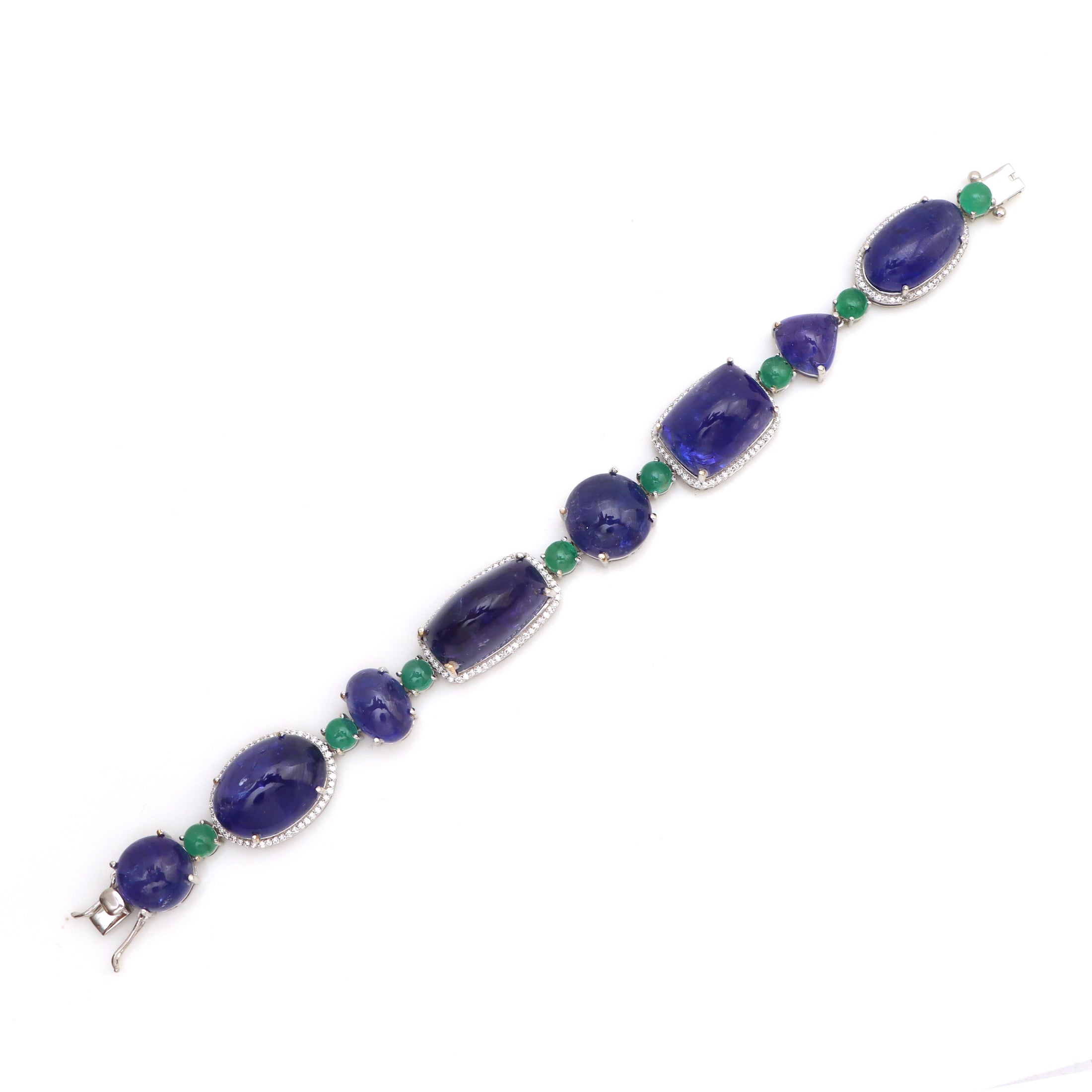 Natural Tanzanite and Emerald 18K gold bracelet lifestyle shot - NFJSD-1473