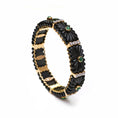 Load image into Gallery viewer, Natural Emerald Round Cabs and Black Onyx Carving 14K gold bangle close-up detail - NFJSD-1128
